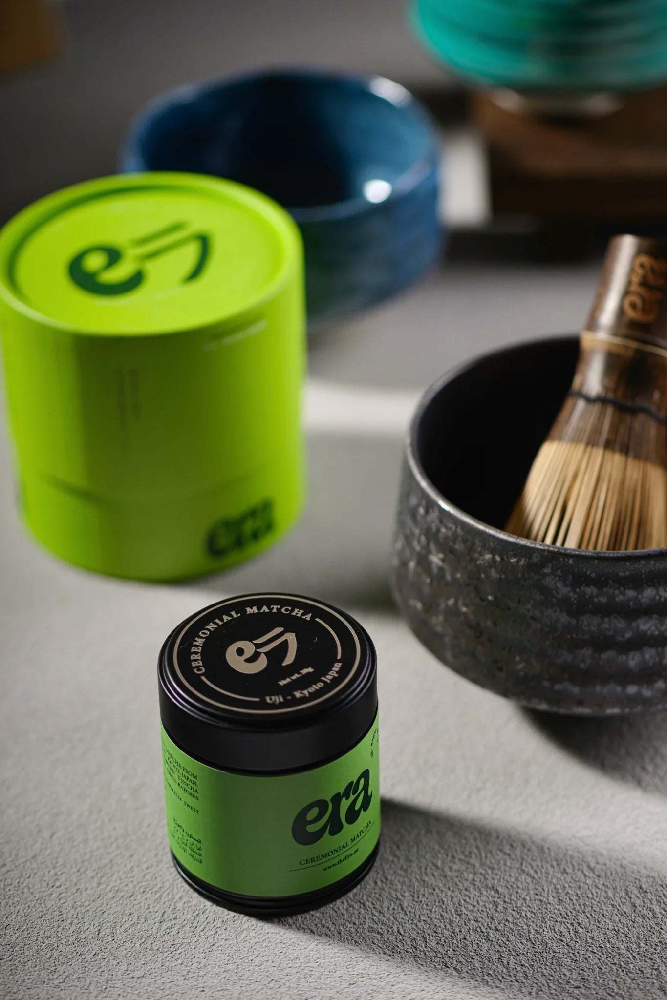 Era ceremonial matcha tins with handmade matcha bowls and bamboo chasen