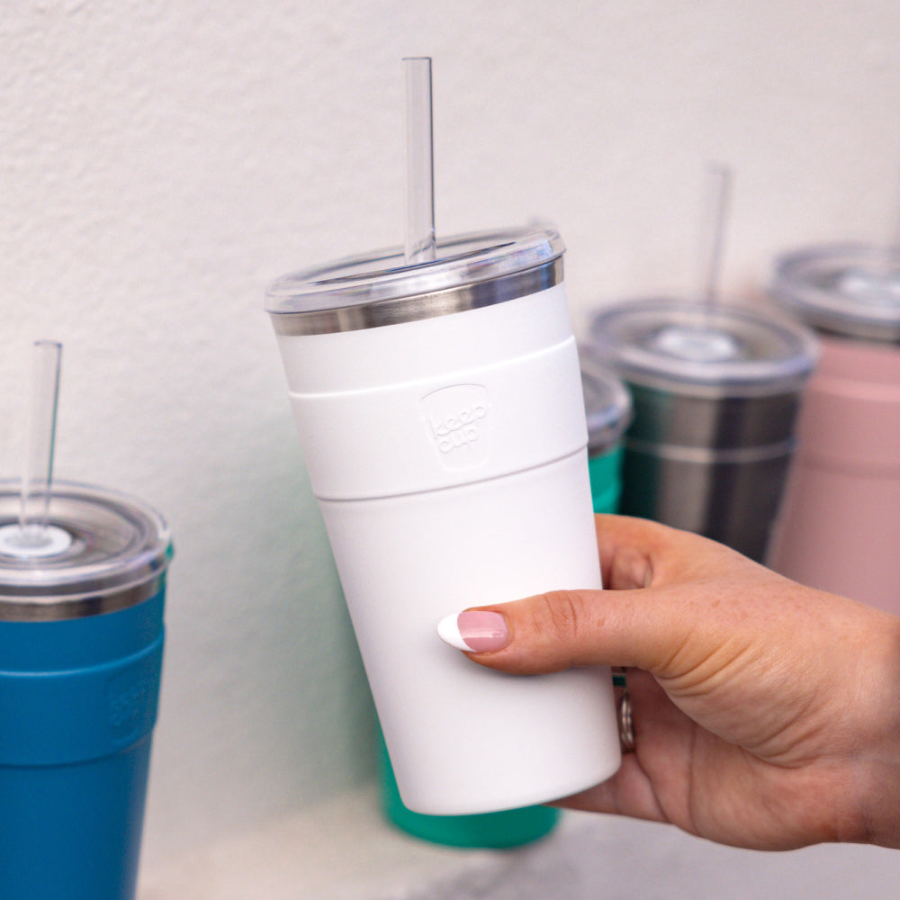 Hand holding a KeepCup Cold Cup Thermal 454ml in White