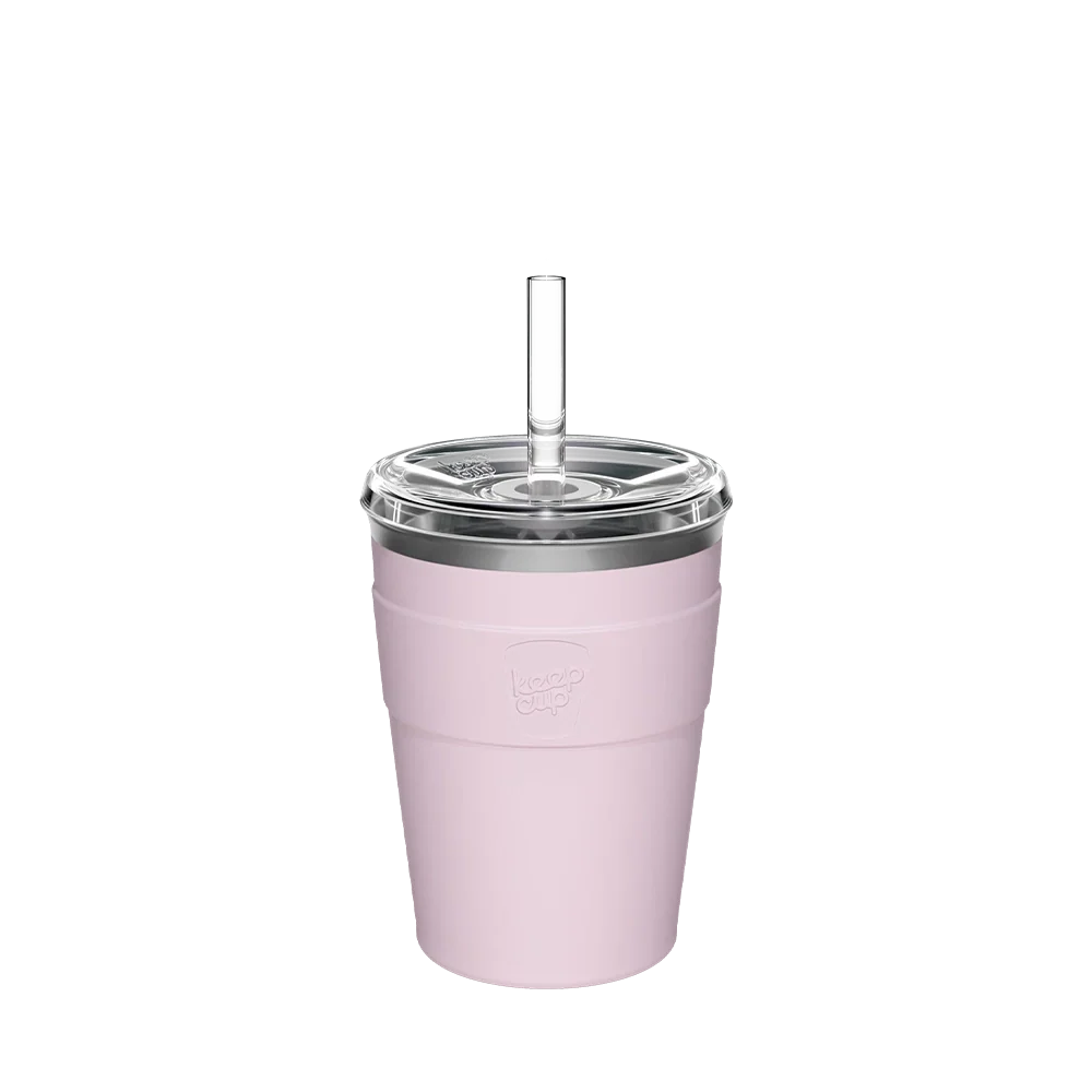 Person in a sage jacket holding a KeepCup Cold Cup Thermal in Pashmak Pink