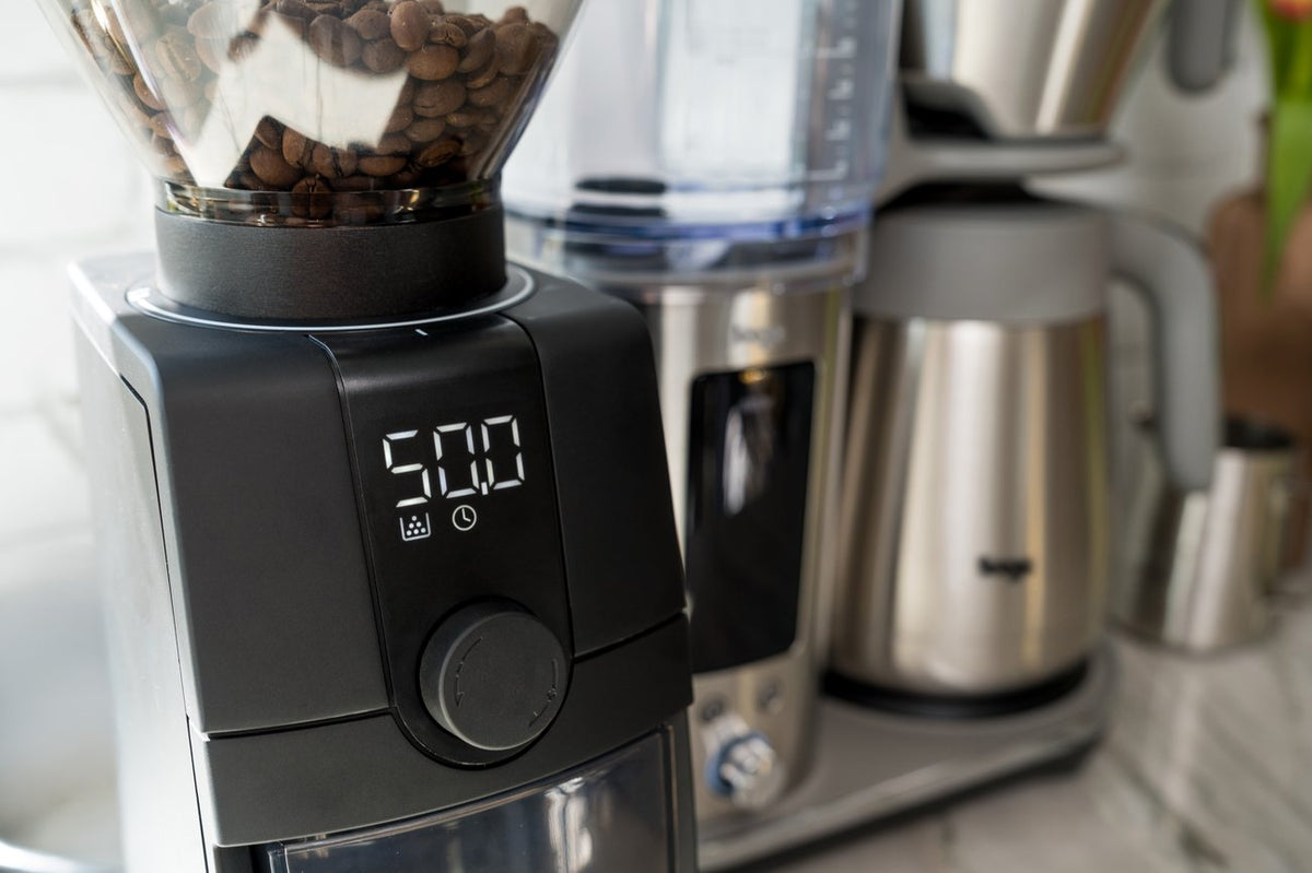 Baratza Encore ESP Pro next to a drip coffee brewer