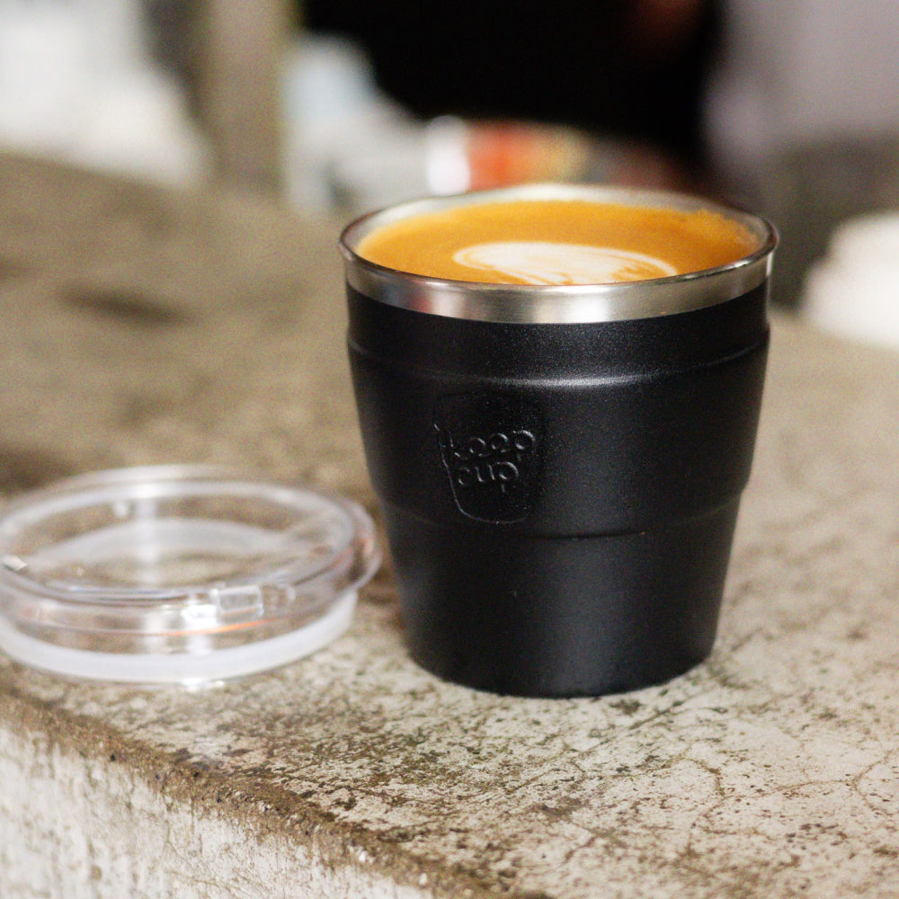 KeepCup Insulated QuickSip Espresso Cup 177ml in Black with a flat white and latte art