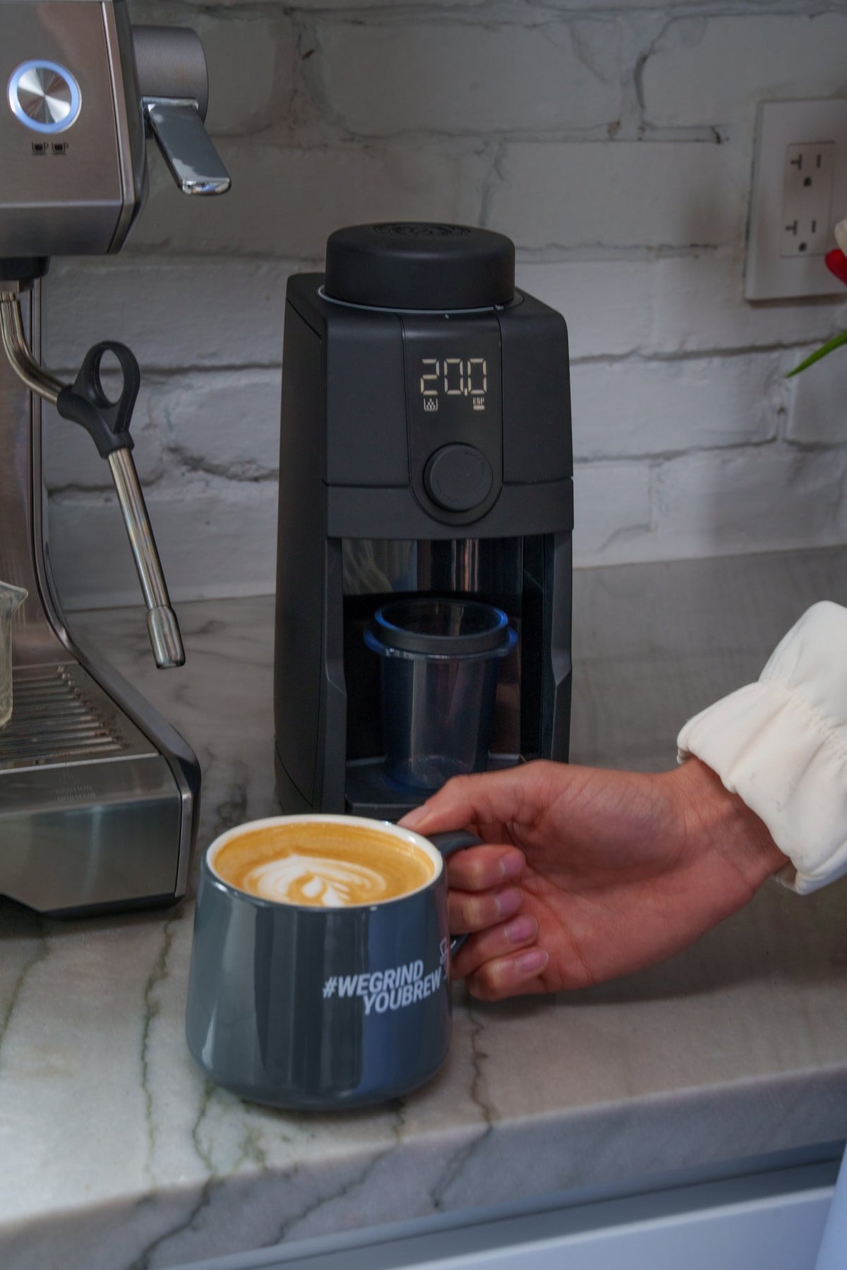 Baratza Encore ESP Pro next to an espresso machine