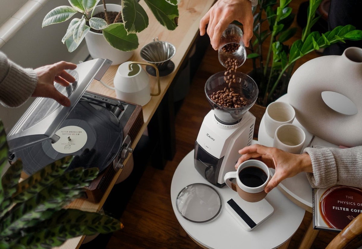 Baratza Encore Coffee Grinder in White on a kitchen counter