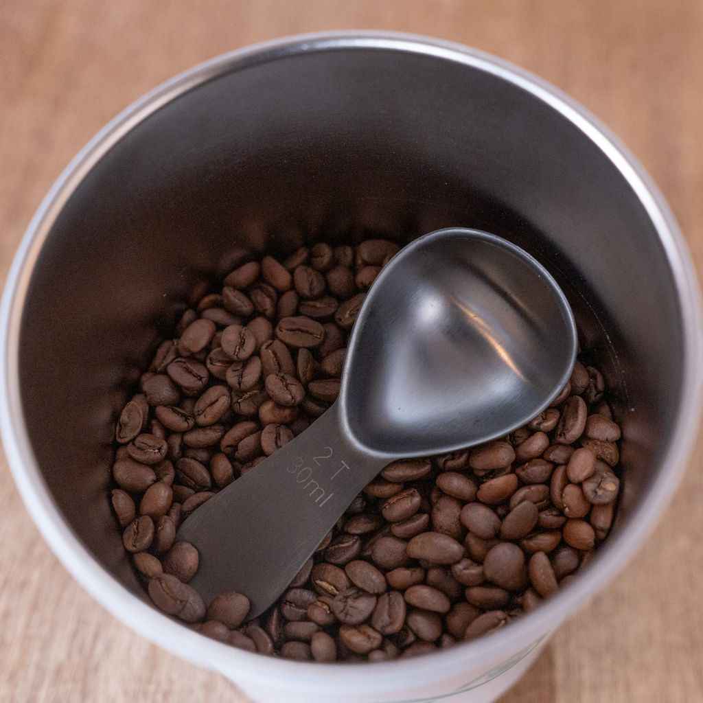 Airscape steel scoop stored inside coffee canister