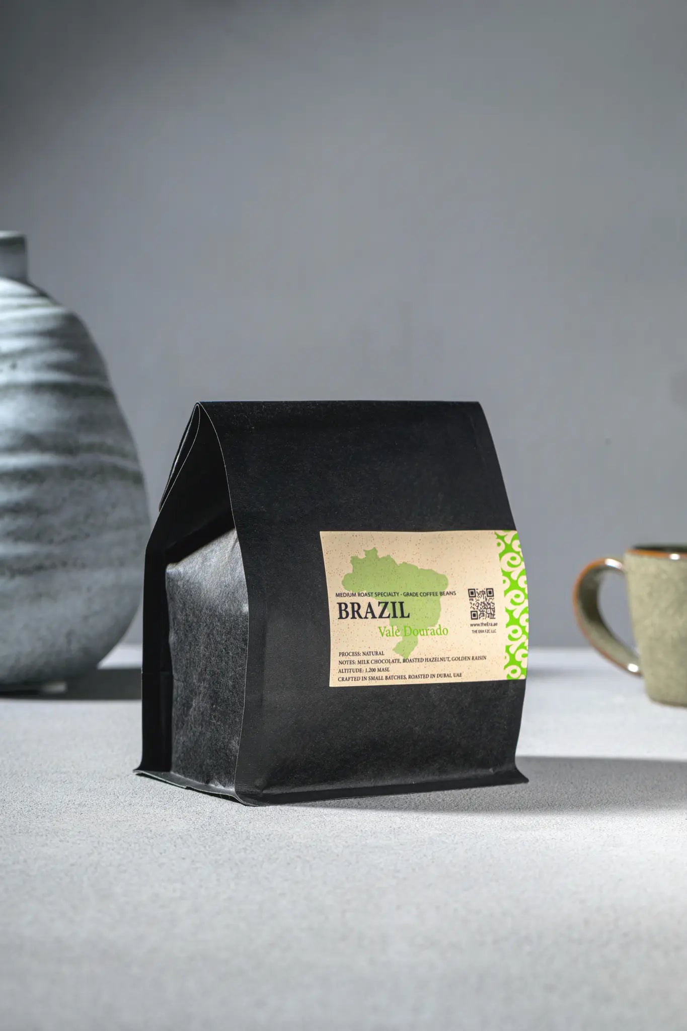 Era Brazil Vale Dourado medium roast coffee bag with green label, roasted in Dubai