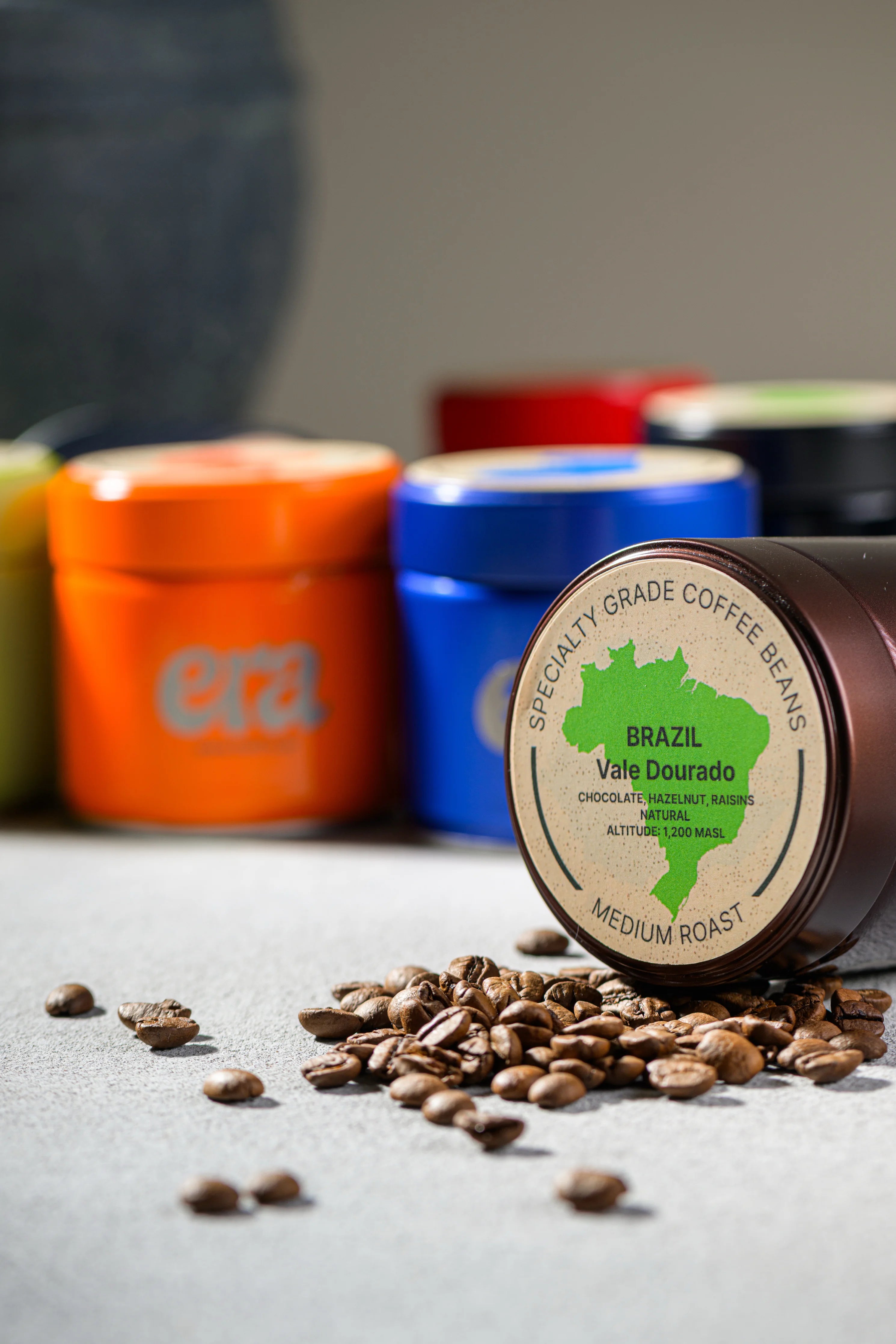 Era Brazil Vale Dourado medium roast coffee tin with roasted beans