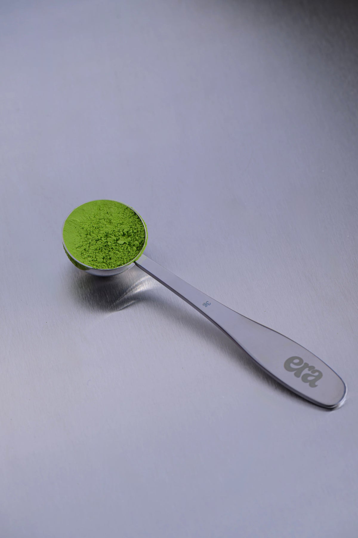 Era stainless steel scoop filled with ceremonial grade Uji matcha