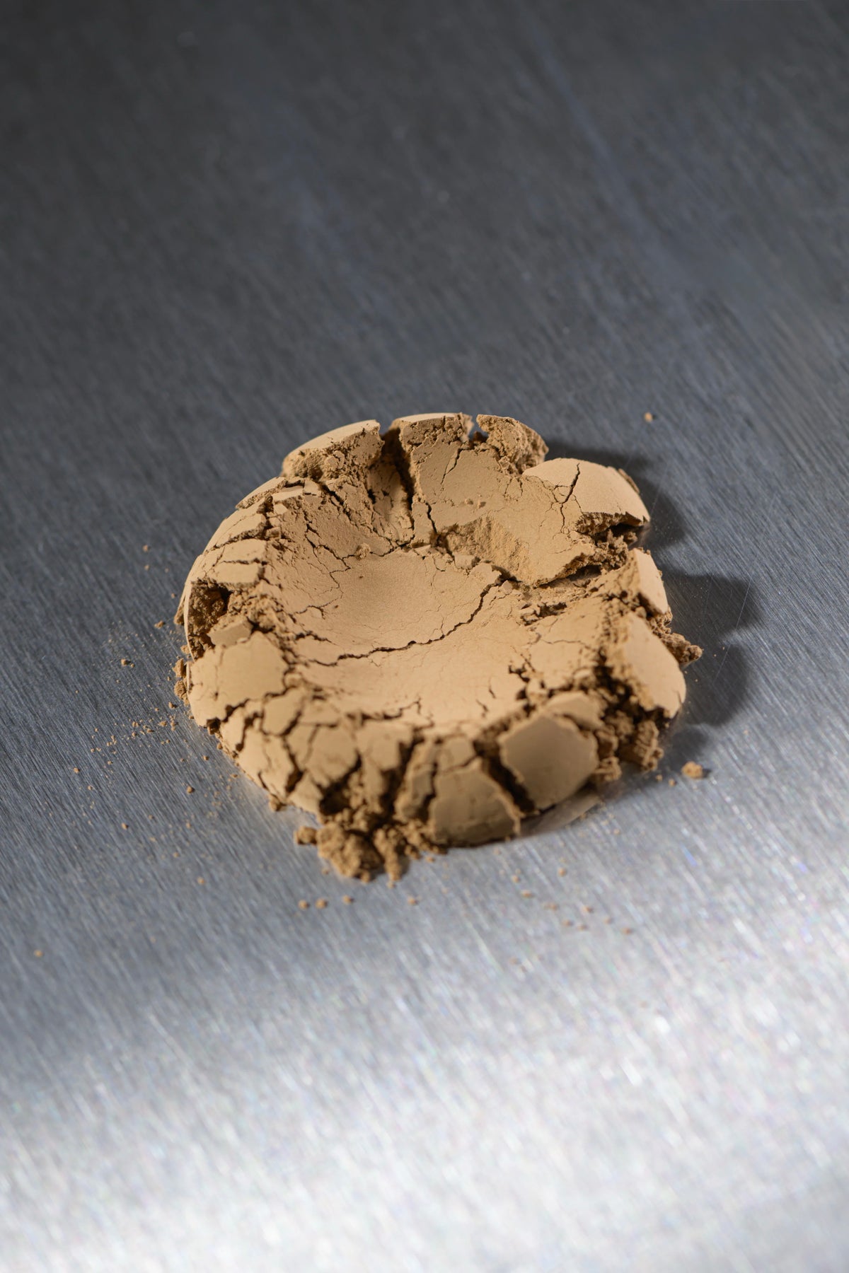 Pressed Uji hojicha powder showing fine roasted texture
