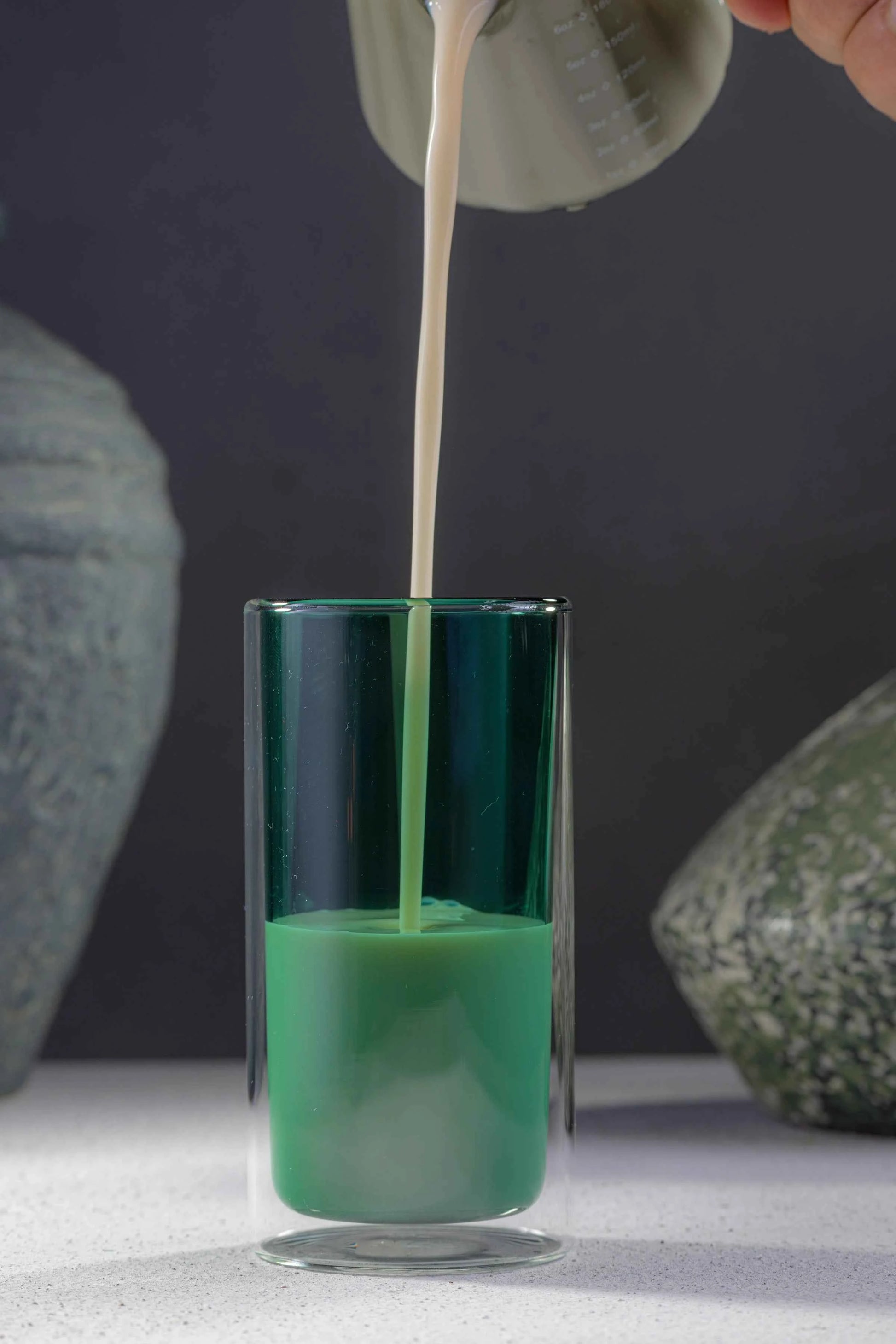 Pouring matcha into the Era Kumo Cup