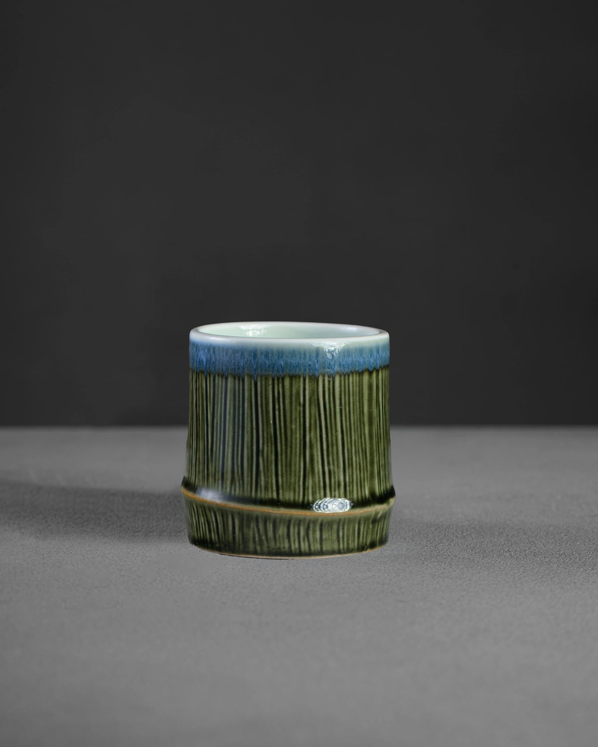 Shizuku Series Chikurin cortado cup - Oribe green bamboo form with blue rim, hand-glazed Mino ware from Japan