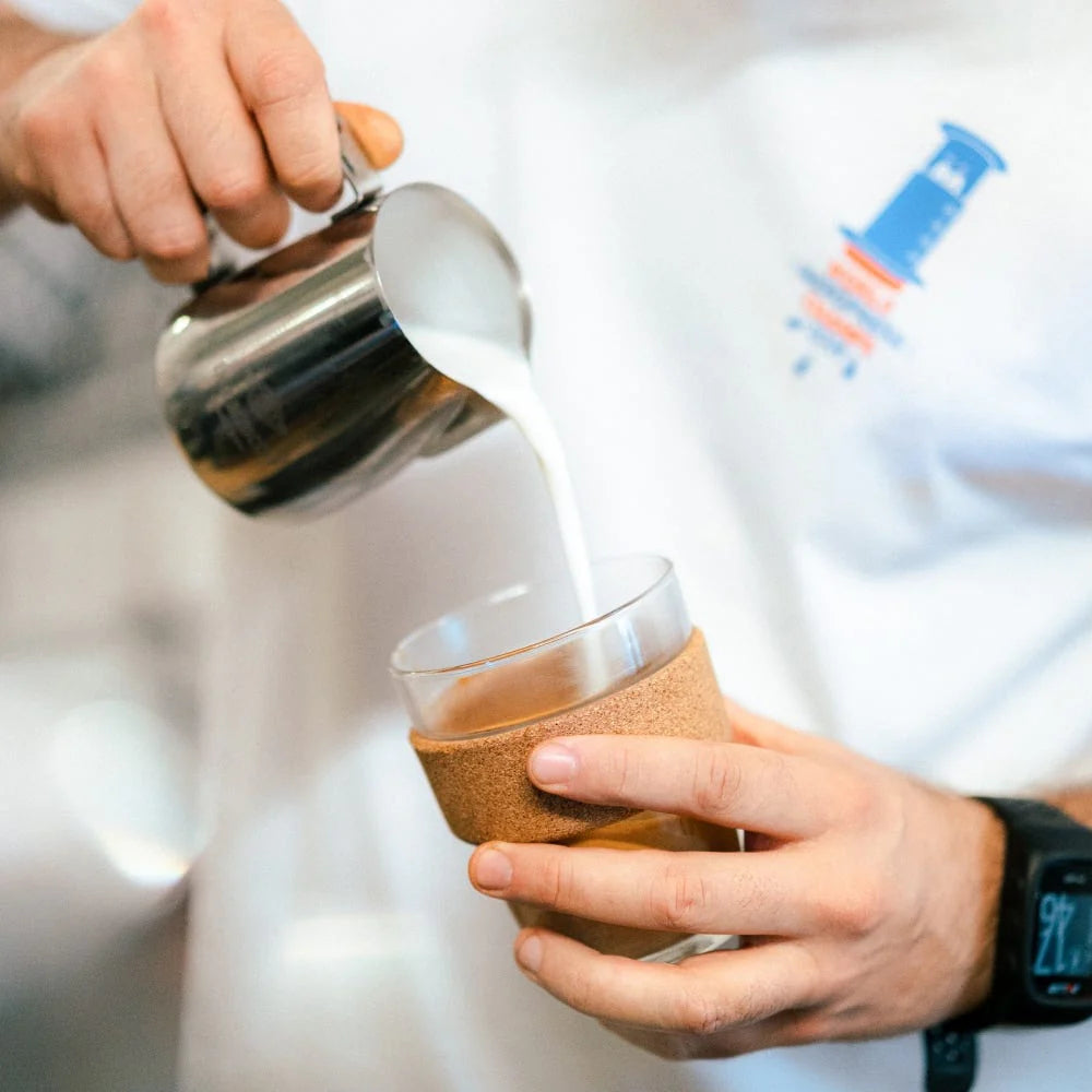 Pouring milk into the KeepCup Brew Cork