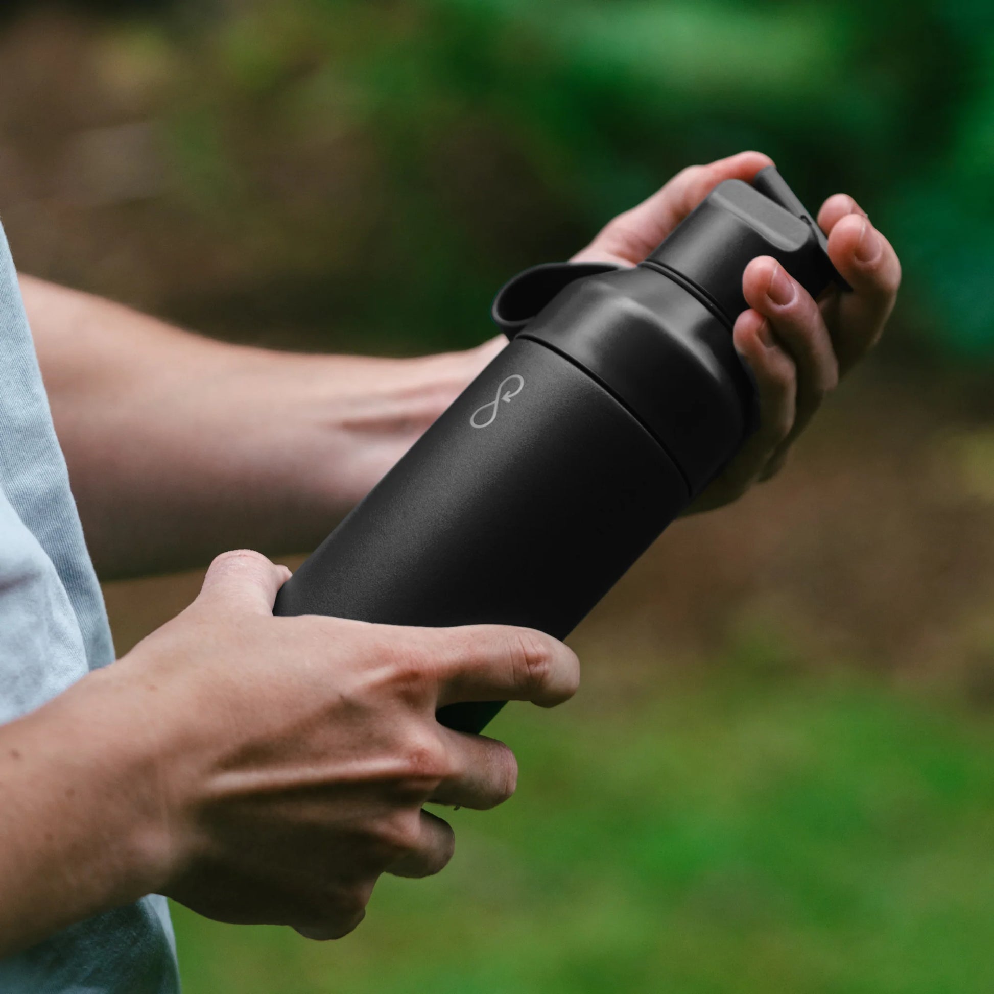 Ocean Bottle 3-in-1 opened to reveal the modular lid