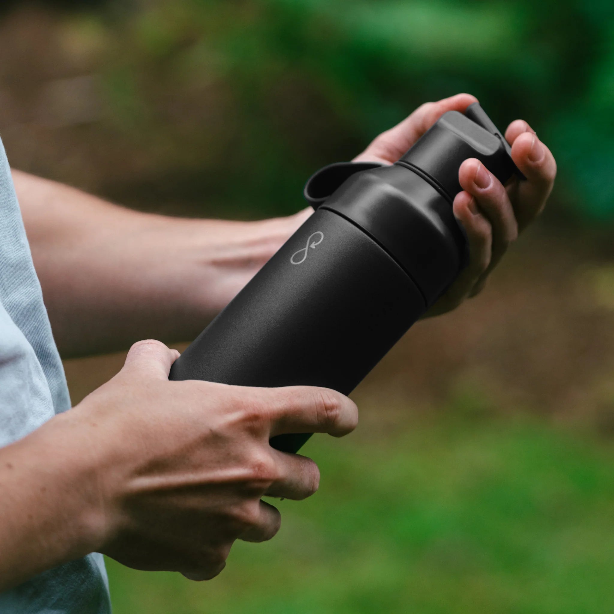 Ocean Bottle 3-in-1 opened to reveal the modular lid