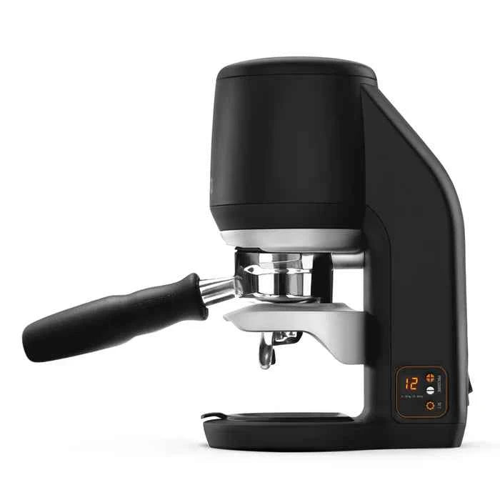 Puqpress Mini tamping a portafilter