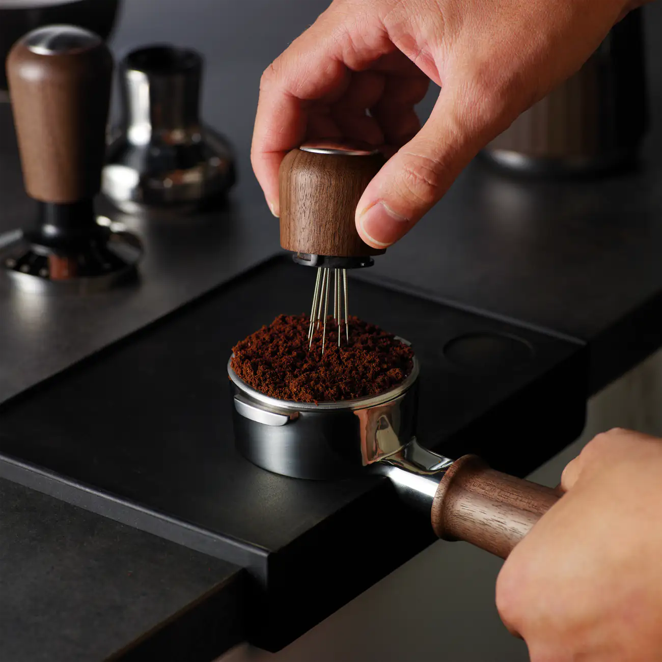 istributing espresso grounds with the Sage Distribution Duo