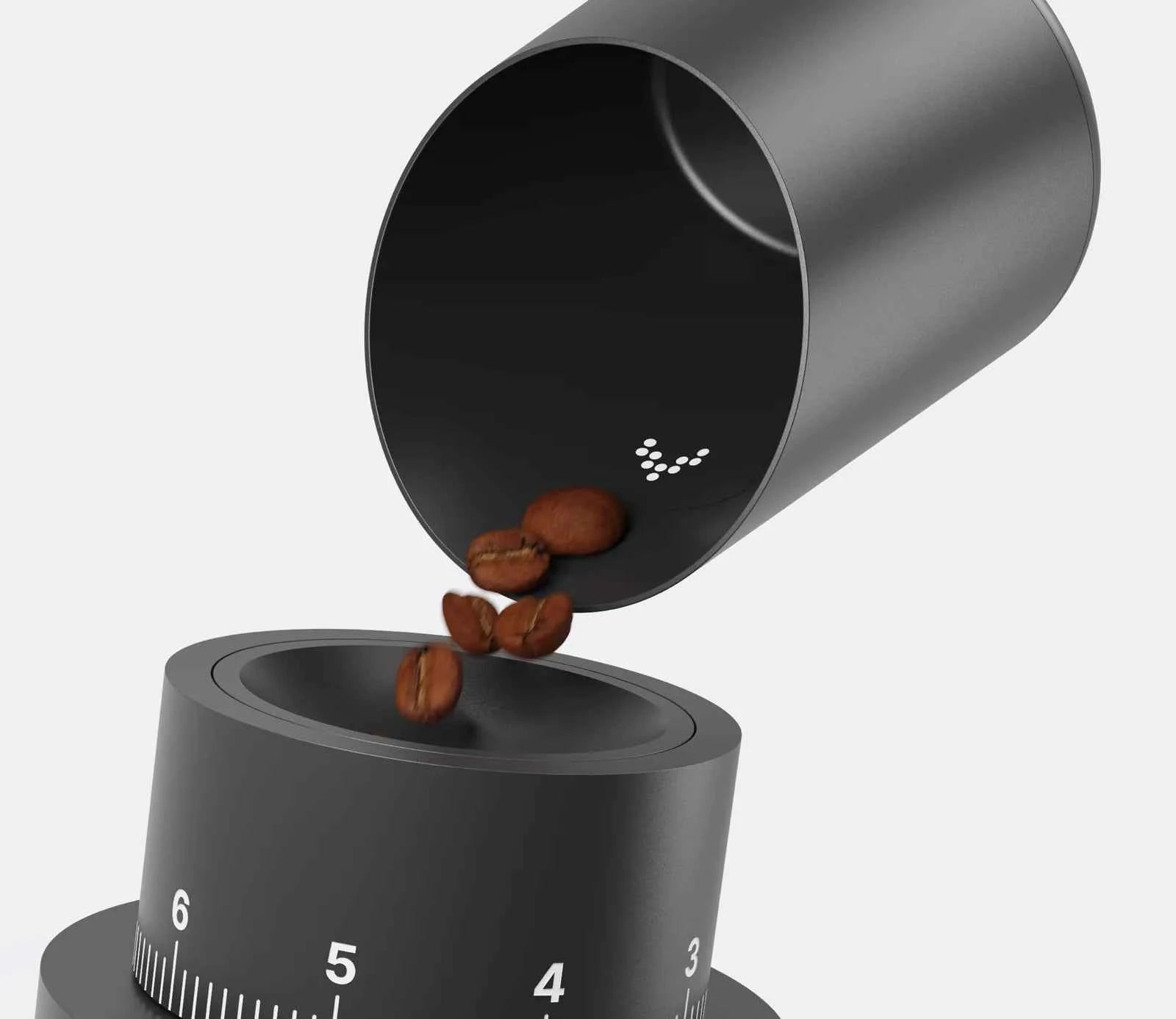 Pouring coffee beans from the Subminimal Subscale into a grinder - close up