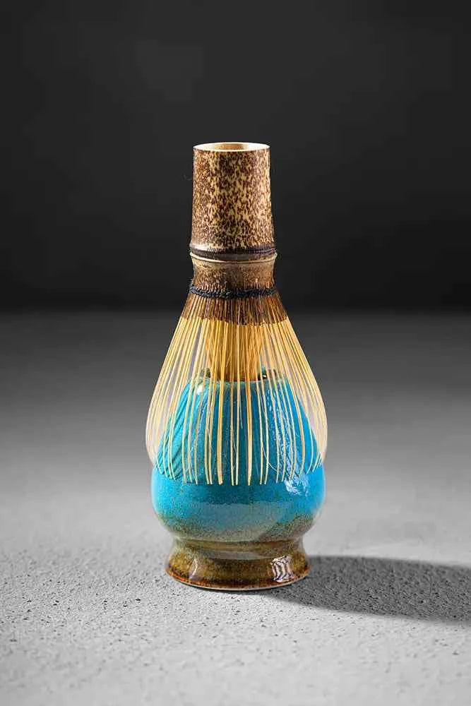 Sumi professional chasen on blue Kata whisk holder
