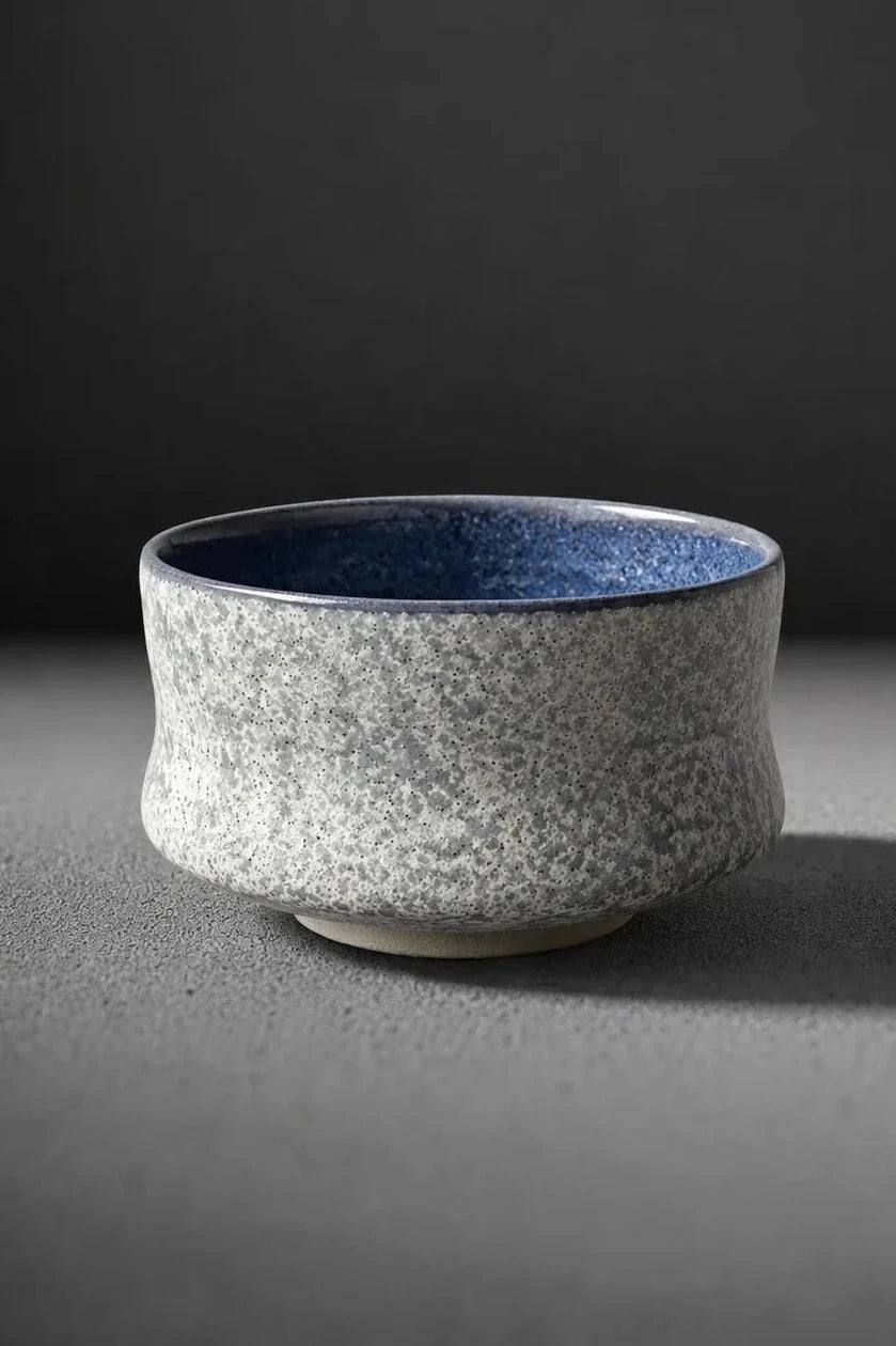 Yohen Series Aoishi matcha bowl - speckled stone glaze with indigo blue interior, handmade in Japan